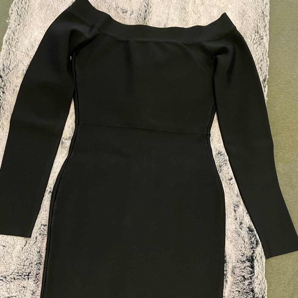 Never worn BCBG Elastic Lycra Shape Black mini Dress